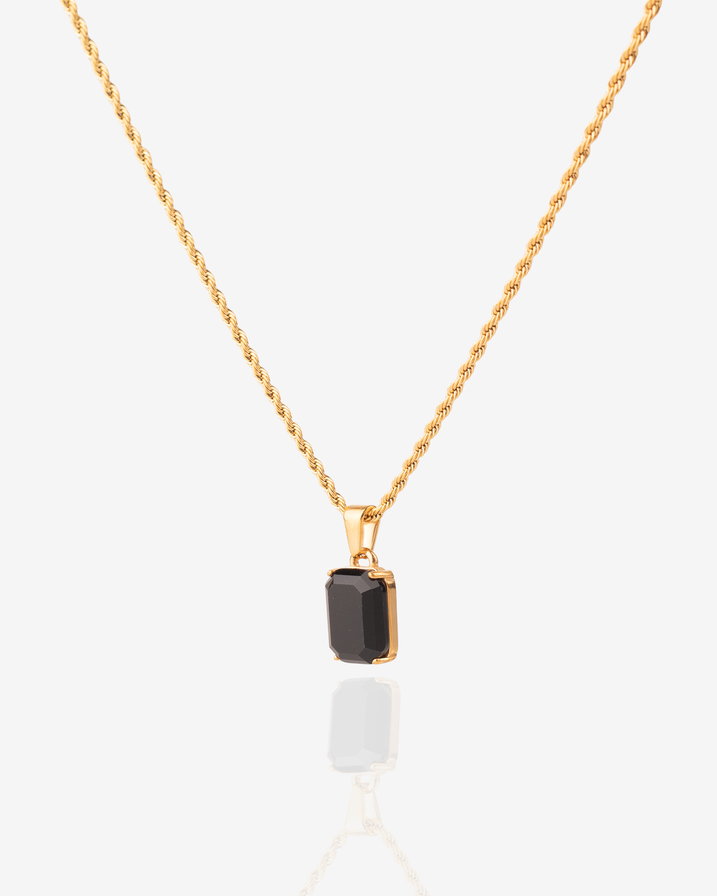 18k gold Necklace with black onyx gemstone on a twisted vintage necklace chain. The necklace is unisex, for both men and women.
