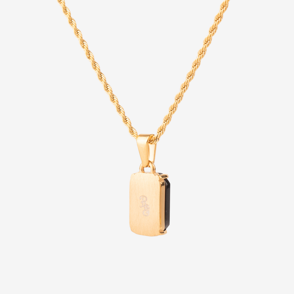 
                  
                    18k gold Necklace with black onyx gemstone on a twisted vintage necklace chain. The necklace is unisex, for both men and women.
                  
                