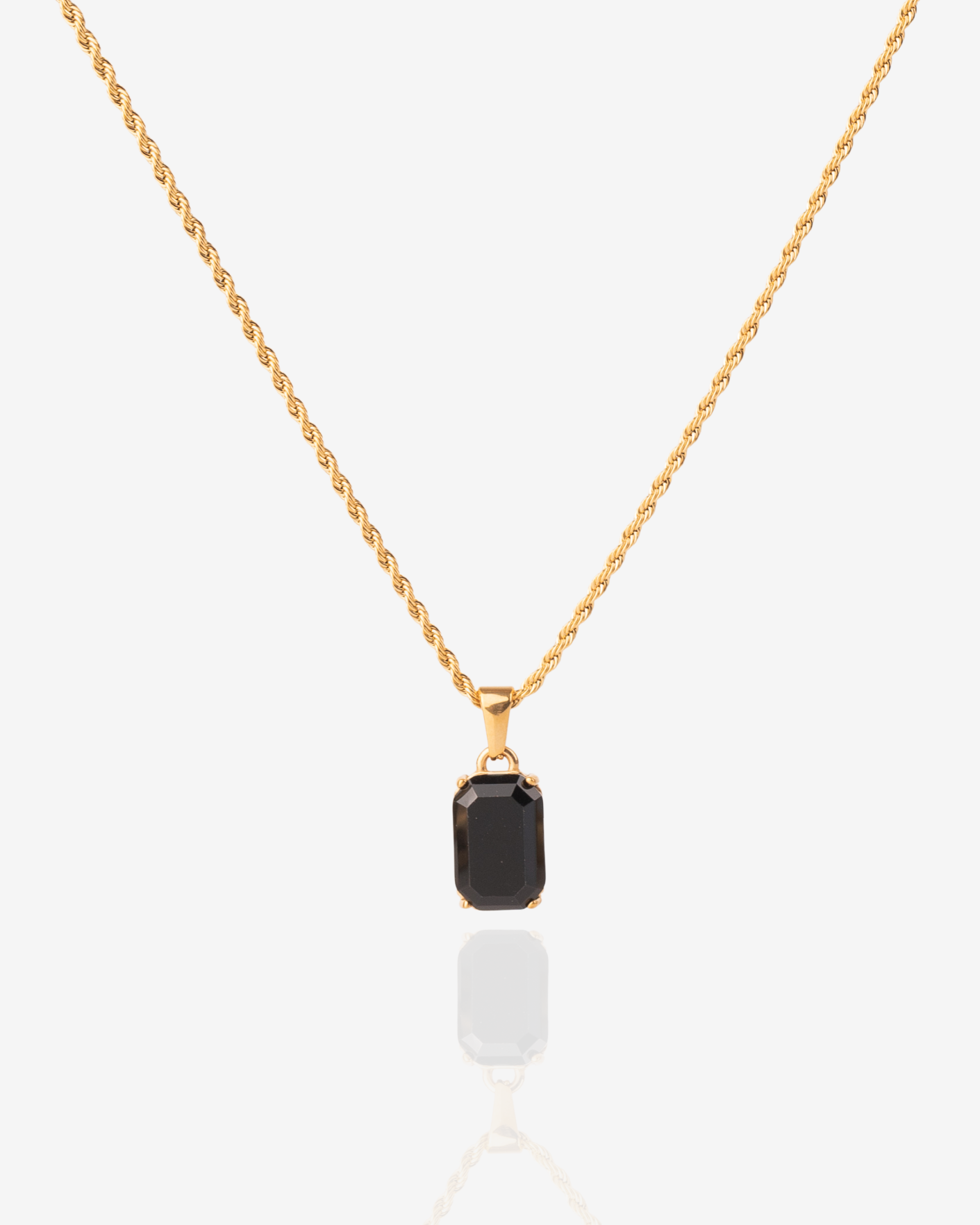 18k gold Necklace with black onyx gemstone on a twisted vintage necklace chain. The necklace is unisex, for both men and women.